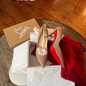 New Christian Louboutin Apostrophy pumps.